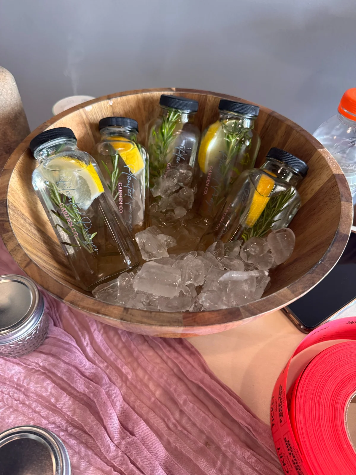 Bottled citrus and herb refreshments from a previous event